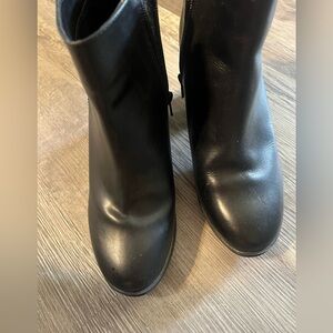 These are gently used black Mussi booties